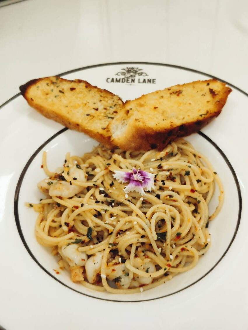 Prawn aglio e olio on a crested Camden Lane plate