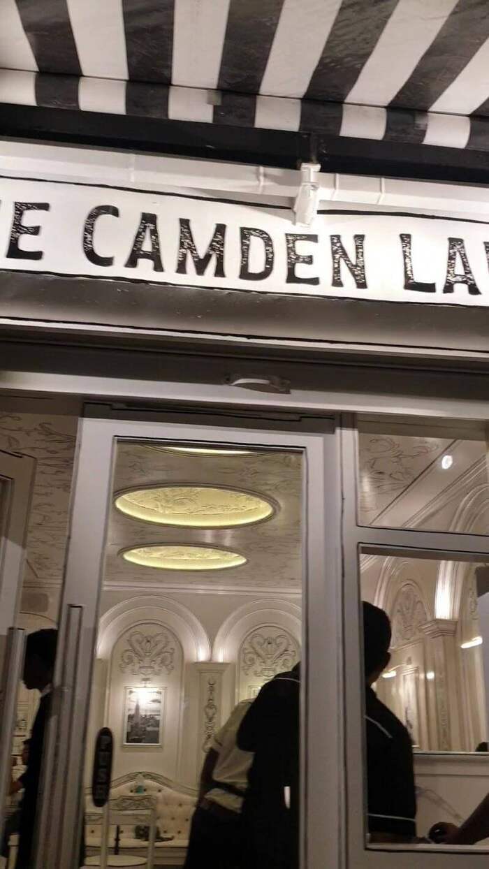 The Camden Lane storefront at night